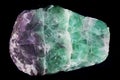 green and violet fluorite mineral isolated