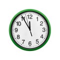 Green wall clock isolated on a white background. Royalty Free Stock Photo