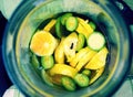 Green wallnuts and limes in homemade liquer.