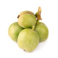 Green walnut, isolated on white background. Peeled walnut and kernels. Walnuts branch Royalty Free Stock Photo