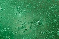 Green water, air and oil mixed for a bubbly effect Royalty Free Stock Photo