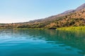 Green water of Kournas lake at Crete island, Greece Royalty Free Stock Photo