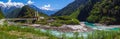 Panoramic view of snow mountain , clear green river landscape of valley Royalty Free Stock Photo