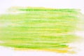 Green watercolor crayon on paper background texture