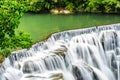 Green waterfall lake