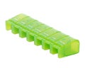 Green weekly pill organizer Royalty Free Stock Photo