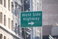 Green West Side Highway direction traffic sign in Manhattan in New York City Royalty Free Stock Photo