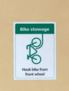 Green and White Bike Stowage Sign on Public Transport Royalty Free Stock Photo