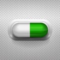 Green and white capsule pill with background