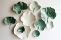 Green and White Ceramic Leaf Dishes on White Background Royalty Free Stock Photo