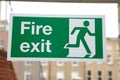 Green and White Fire Exit Sign Royalty Free Stock Photo