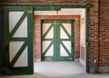 Green and white horse stable doors