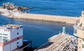 Green and white lighthouse on concrete pier Royalty Free Stock Photo