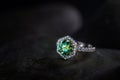 A green and white ring with a diamond in the center Royalty Free Stock Photo