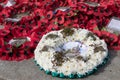 Memorial wreaths on teh ground. St Patricks day and poppys