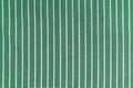 Green white striped fabric texture background with copy space Royalty Free Stock Photo