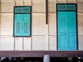 Green window and the door made of wood thai style Royalty Free Stock Photo