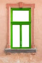 Green window frame on old wall Royalty Free Stock Photo