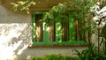 Green window and tree shade in the garden Royalty Free Stock Photo