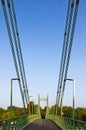 Wire bridge against blue sky