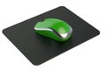 Green Wireless Computer Mouse on mouse mat Royalty Free Stock Photo