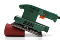 Green wood sander with sandpaper roll Royalty Free Stock Photo