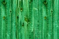 Green wooden background. St. Patrick`s Day Textured old wood with frayed and knotted texture. Spring holidays concept. Royalty Free Stock Photo