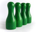 Green wooden bowling pins