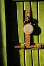 Green wooden door with key lock Royalty Free Stock Photo