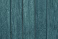 Green wooden fence closeup. Green and gray wooden table. Wooden gray-green boards. Wood texture. Green wooden planks of the oak ta Royalty Free Stock Photo