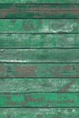 Green wooden narrow boards top view.