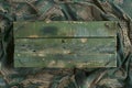 Green Wooden Planks on Camouflage Netting Background