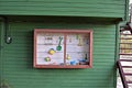 Green wooden wall and sandbox toys