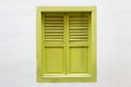 Green wooden window is classic vintage style on white cement wall Royalty Free Stock Photo