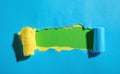 Green, yellow, blue torn paper. Space for your text Royalty Free Stock Photo