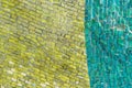 Green and yellow colorful surface of ceramic stones. smalt mosaic with high resolution for background. abstract pattern for design
