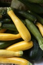 Green and yellow courgette in the marketplace