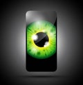 Realistic green eyeball on a cell mobile phone