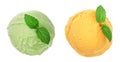 green and yellow ice cream ball with a mint leaf isolated on white background, top view Royalty Free Stock Photo