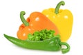 Green, yellow and orange peppers on an isolated white background. Royalty Free Stock Photo