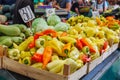 green yellow orange red bell pepper paprika on a farmer's market