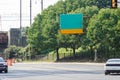 Green and yellow over road street sign over a highway Royalty Free Stock Photo