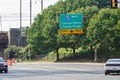 Green and yellow over road street sign in Philadelphia showing the exit for Central Philadelphia and Valley Forge