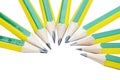 Green and yellow pencils alternating in semicircle shape