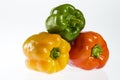 Green, yellow and red bell peppers Royalty Free Stock Photo