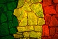 Green yellow red on rock stone texture,reggae background Royalty Free Stock Photo