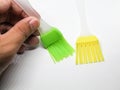 Green and yellow silicone brush for baking cakes