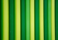 Green and yellow steel wall pattern in vertical line. Royalty Free Stock Photo