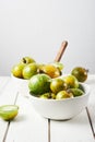 Green zebra tomatoes in a bowl Royalty Free Stock Photo