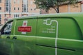 Green zero emissions electric Royal Mail van on a street in London, UK Royalty Free Stock Photo